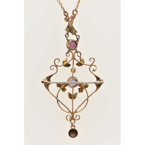 443 - AN EARLY 20TH CENTURY GEM SET LAVALIER PENDANT AND CHAIN, rose metal open work pendant, set with a c... 