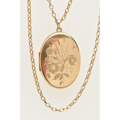 444 - A 9CT GOLD OVAL LOCKET PENDANT WITH CHAIN, the oval locket decorated with a floral pattern, opens to... 
