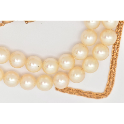 449 - TWO NECKLACES, the first an oval cut Citrine pendant in a yellow metal mount with tapered bail, unma... 