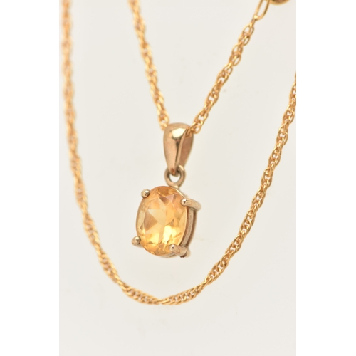 449 - TWO NECKLACES, the first an oval cut Citrine pendant in a yellow metal mount with tapered bail, unma... 