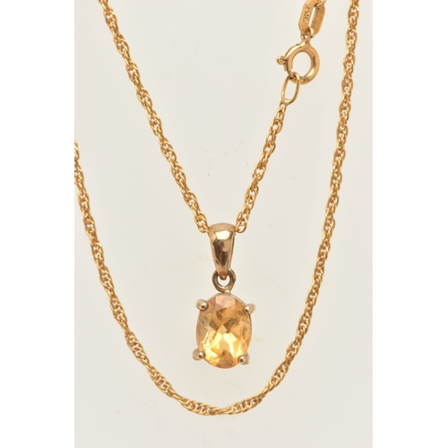 449 - TWO NECKLACES, the first an oval cut Citrine pendant in a yellow metal mount with tapered bail, unma... 
