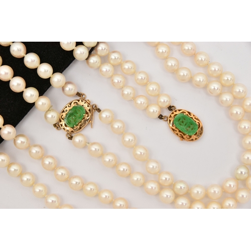 451 - A CULTURED PEARL NECKLACE AND BRACELET, designed as a cultured pearl double strand necklace, approxi... 