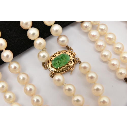 451 - A CULTURED PEARL NECKLACE AND BRACELET, designed as a cultured pearl double strand necklace, approxi... 