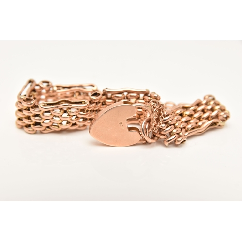 452 - A ROSE METAL BRACELET, a brick link bracelet fitted with a heart padlock clasp, stamped 9ct, approxi... 