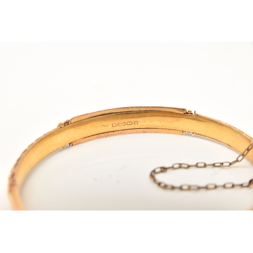453 - A LATE VICTORIAN 15CT GOLD HINGED BANGLE, Etruscan design with applied bead work, fitted with a push... 