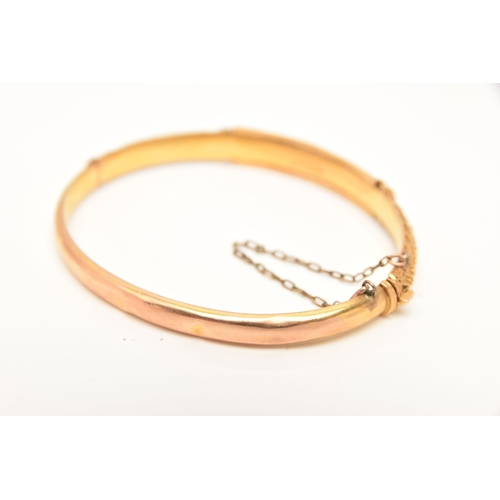 453 - A LATE VICTORIAN 15CT GOLD HINGED BANGLE, Etruscan design with applied bead work, fitted with a push... 