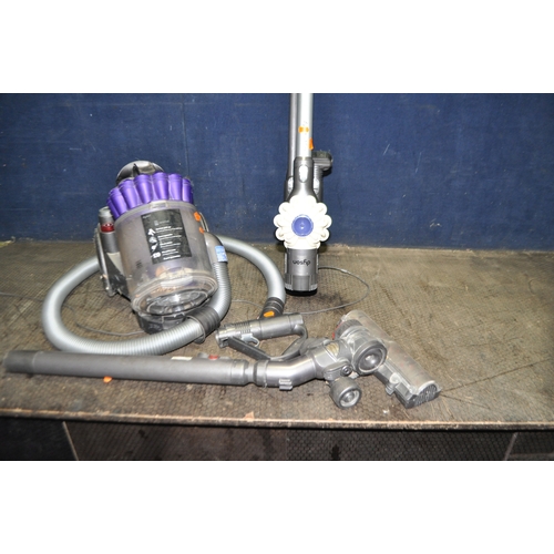 82 - A DYSON DC32 VACUUM CLEANER, and a V6 Flexi cordless vacuum (battery integrity unknown) with power s... 