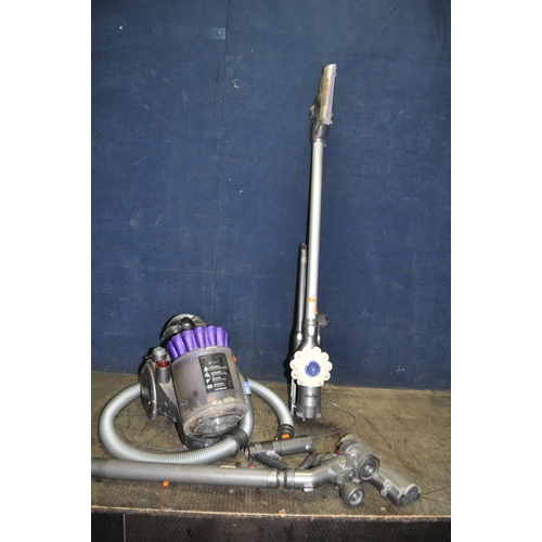 82 - A DYSON DC32 VACUUM CLEANER, and a V6 Flexi cordless vacuum (battery integrity unknown) with power s... 