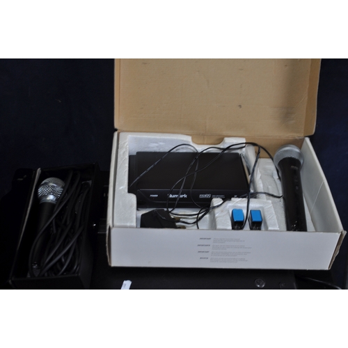 91 - A KUSTOM KPM480 PA AMPLIFIER, a pair of Kustom speakers, two tripod stands, a Numark radio mic (hand... 