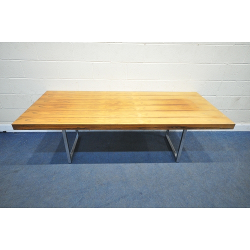 150 - IN THE MANNER OF MERROW ASSOCIATES, A MID-CENTURY ROSEWOOD RECTANGULAR DINING TABLE, raised on squar... 