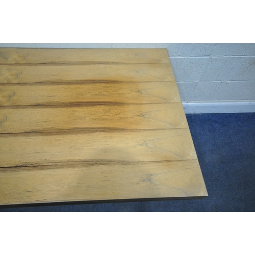 150 - IN THE MANNER OF MERROW ASSOCIATES, A MID-CENTURY ROSEWOOD RECTANGULAR DINING TABLE, raised on squar... 