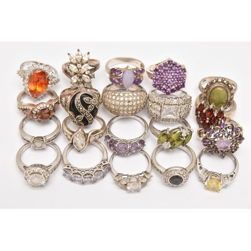 AN ASSORTMENT OF WHITE METAL RINGS, twenty rings in total, some set ...