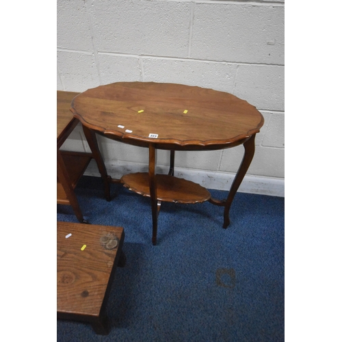 223 - A 20TH CENTURY OVAL TABLE, with a wavy edge, raised on four shaped legs, united by an undershelf, wi...