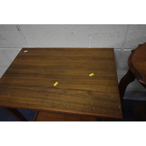 223 - A 20TH CENTURY OVAL TABLE, with a wavy edge, raised on four shaped legs, united by an undershelf, wi...