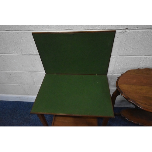 223 - A 20TH CENTURY OVAL TABLE, with a wavy edge, raised on four shaped legs, united by an undershelf, wi...