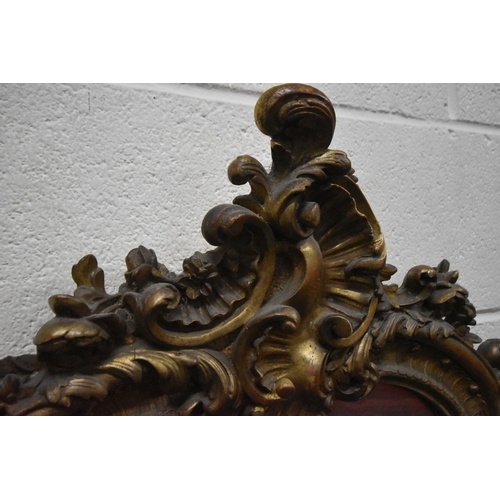266 - A 19TH CENTURY GILT WOOD AND RESIN BEVELLED EDGE OVER-MANTEL MIRROR, with scrolled and foliate desig... 
