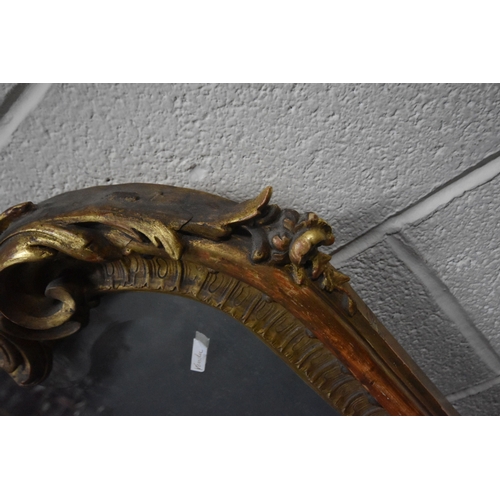 266 - A 19TH CENTURY GILT WOOD AND RESIN BEVELLED EDGE OVER-MANTEL MIRROR, with scrolled and foliate desig... 