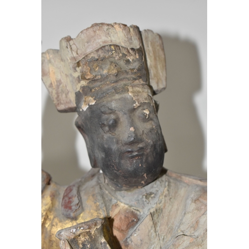 792 - A GROUP OF THREE CHINESE QING DYNASTY CARVED ANCESTRAL VOTIVE FIGURES comprising a figure riding a h... 