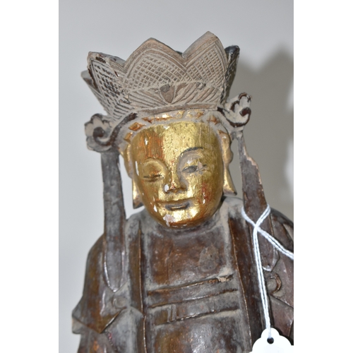 792 - A GROUP OF THREE CHINESE QING DYNASTY CARVED ANCESTRAL VOTIVE FIGURES comprising a figure riding a h... 