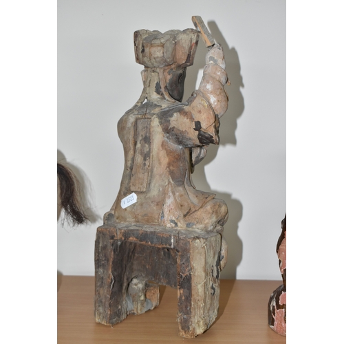 792 - A GROUP OF THREE CHINESE QING DYNASTY CARVED ANCESTRAL VOTIVE FIGURES comprising a figure riding a h... 