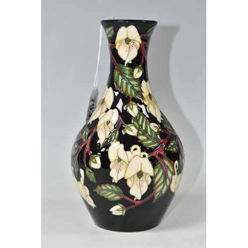 793 - A MOORCROFT POTTERY 'MOUNTAIN GOLD' VASE, designed by Sian Leeper, featuring tube line white and yel... 