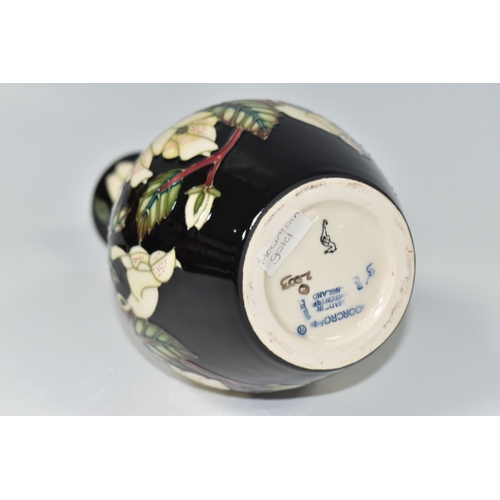 793 - A MOORCROFT POTTERY 'MOUNTAIN GOLD' VASE, designed by Sian Leeper, featuring tube line white and yel... 