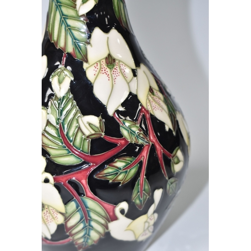 793 - A MOORCROFT POTTERY 'MOUNTAIN GOLD' VASE, designed by Sian Leeper, featuring tube line white and yel... 