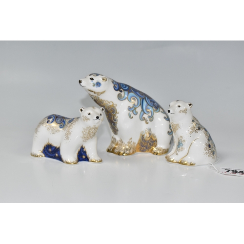 794 - THREE ROYAL CROWN DERBY PAPERWEIGHTS, comprising, 'Polar Bear', gold stopper, MMIX, 'Standing Polar ... 