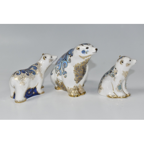 794 - THREE ROYAL CROWN DERBY PAPERWEIGHTS, comprising, 'Polar Bear', gold stopper, MMIX, 'Standing Polar ... 
