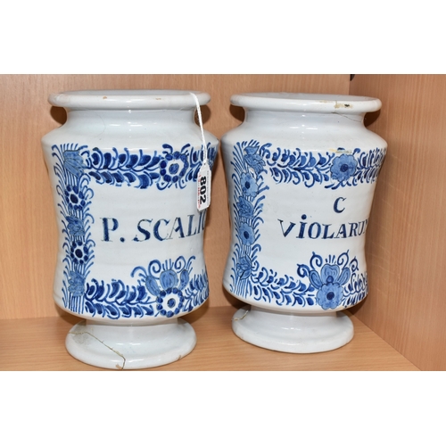 802 - BLUE AND WHITE VINTAGE DELFTWARE APOTHECARY JARS, featuring one that has the words P. SCALIG, (Scali... 