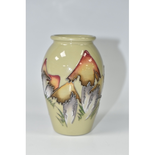 803 - A MOORCROFT POTTERY MAGICAL TOADSTOOL VASE, featuring tube line pattern Magical Toadstool, on a sage... 