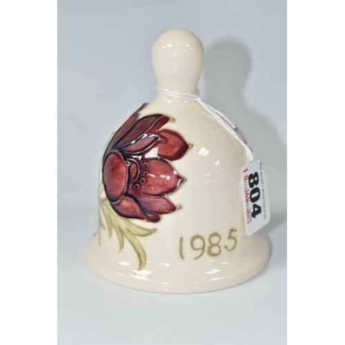 804 - A MOORCROFT POTTERY 1985 YEAR BELL, with a tube lined Anemone pattern on a cream ground, painted mar... 