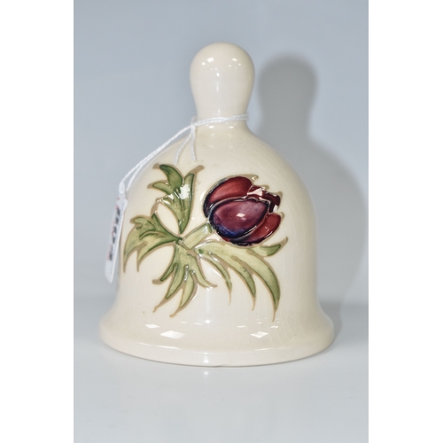 804 - A MOORCROFT POTTERY 1985 YEAR BELL, with a tube lined Anemone pattern on a cream ground, painted mar... 