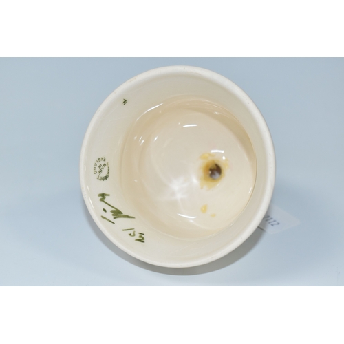 804 - A MOORCROFT POTTERY 1985 YEAR BELL, with a tube lined Anemone pattern on a cream ground, painted mar... 