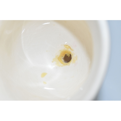 804 - A MOORCROFT POTTERY 1985 YEAR BELL, with a tube lined Anemone pattern on a cream ground, painted mar... 