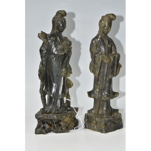812 - TWO CHINESE CARVED NEPHRITE FIGURES possibly depicting He Xiangu comprising a sculpture of the figur... 