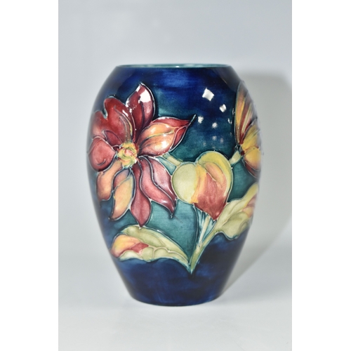815 - A MOORCROFT POTTERY 'DAHLIA' PATTERN VASE, of ovoid form, tube-lined with red, yellow and purple dah... 