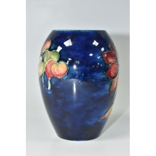 815 - A MOORCROFT POTTERY 'DAHLIA' PATTERN VASE, of ovoid form, tube-lined with red, yellow and purple dah... 