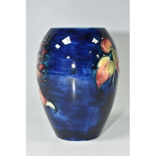 815 - A MOORCROFT POTTERY 'DAHLIA' PATTERN VASE, of ovoid form, tube-lined with red, yellow and purple dah... 