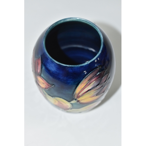 815 - A MOORCROFT POTTERY 'DAHLIA' PATTERN VASE, of ovoid form, tube-lined with red, yellow and purple dah... 