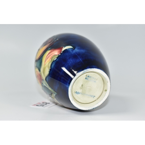 815 - A MOORCROFT POTTERY 'DAHLIA' PATTERN VASE, of ovoid form, tube-lined with red, yellow and purple dah... 