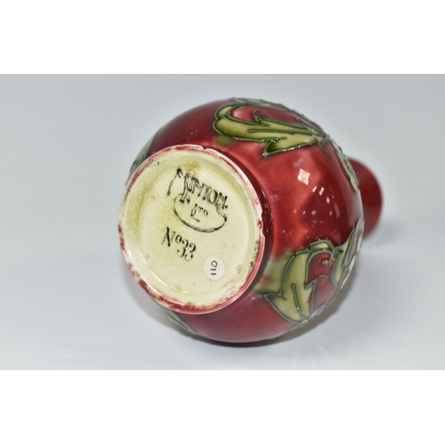 817 - A MINTON SECESSIONIST BALUSTER VASE, tube-lined with white flowers on a red ground, shape no 33, pri... 