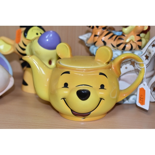 819 - FOUR CARDEW DESIGN DISNEY SHOWCASE COLLECTION 'WINNIE THE POOH' NOVELTY TEAPOTS, comprising a Cardew... 
