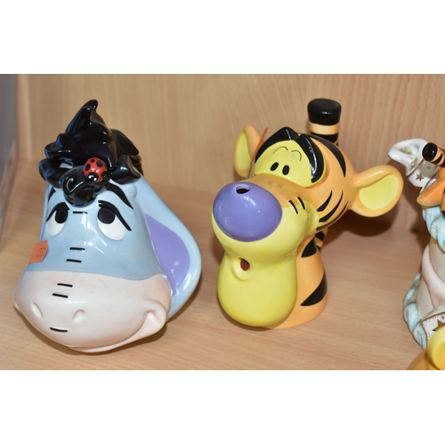 819 - FOUR CARDEW DESIGN DISNEY SHOWCASE COLLECTION 'WINNIE THE POOH' NOVELTY TEAPOTS, comprising a Cardew... 
