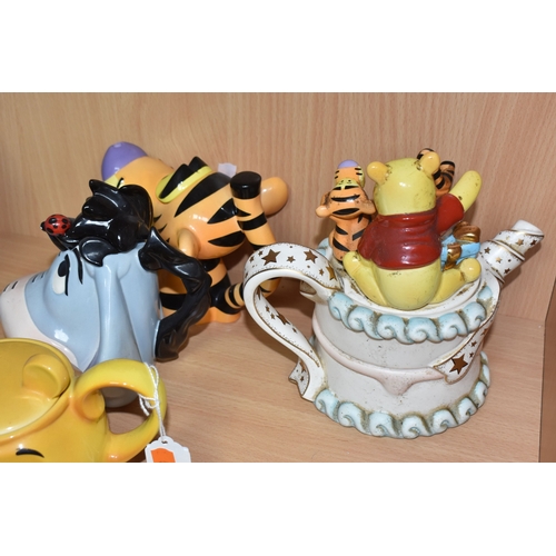819 - FOUR CARDEW DESIGN DISNEY SHOWCASE COLLECTION 'WINNIE THE POOH' NOVELTY TEAPOTS, comprising a Cardew... 