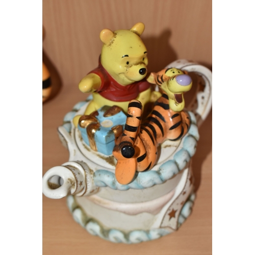 819 - FOUR CARDEW DESIGN DISNEY SHOWCASE COLLECTION 'WINNIE THE POOH' NOVELTY TEAPOTS, comprising a Cardew... 