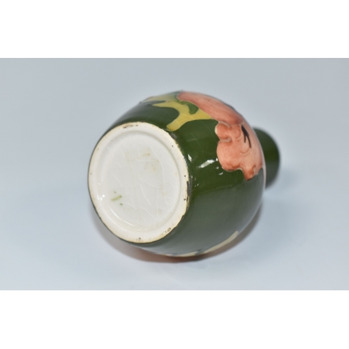 820 - A MOORCROFT POTTERY 'CORAL HIBISCUS' PATTERN VASE, the small bud vase tube-lined with coral pink hib... 