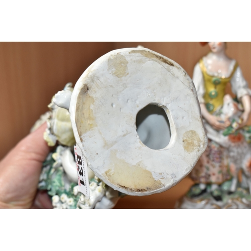 831 - FOUR LATE EIGHTEENTH CENTURY DERBY PORCELAIN FIGURES, comprising a bocage encrusted figural candlest... 