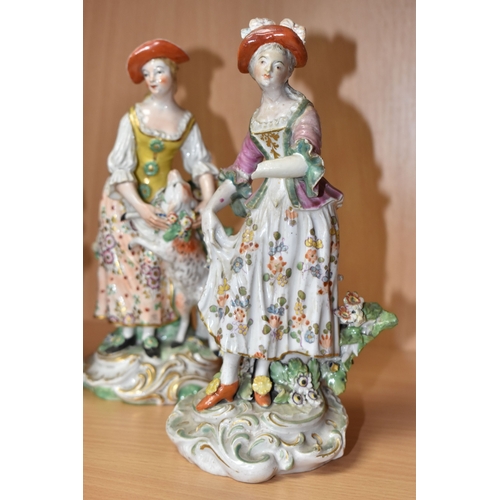 831 - FOUR LATE EIGHTEENTH CENTURY DERBY PORCELAIN FIGURES, comprising a bocage encrusted figural candlest... 