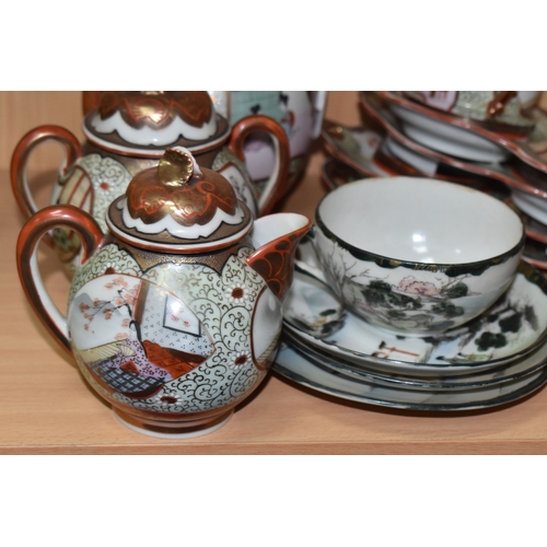 838 - A GROUP OF JAPANESE TEA WARE, two part sets, comprising items with dark green rims and handles: a te... 